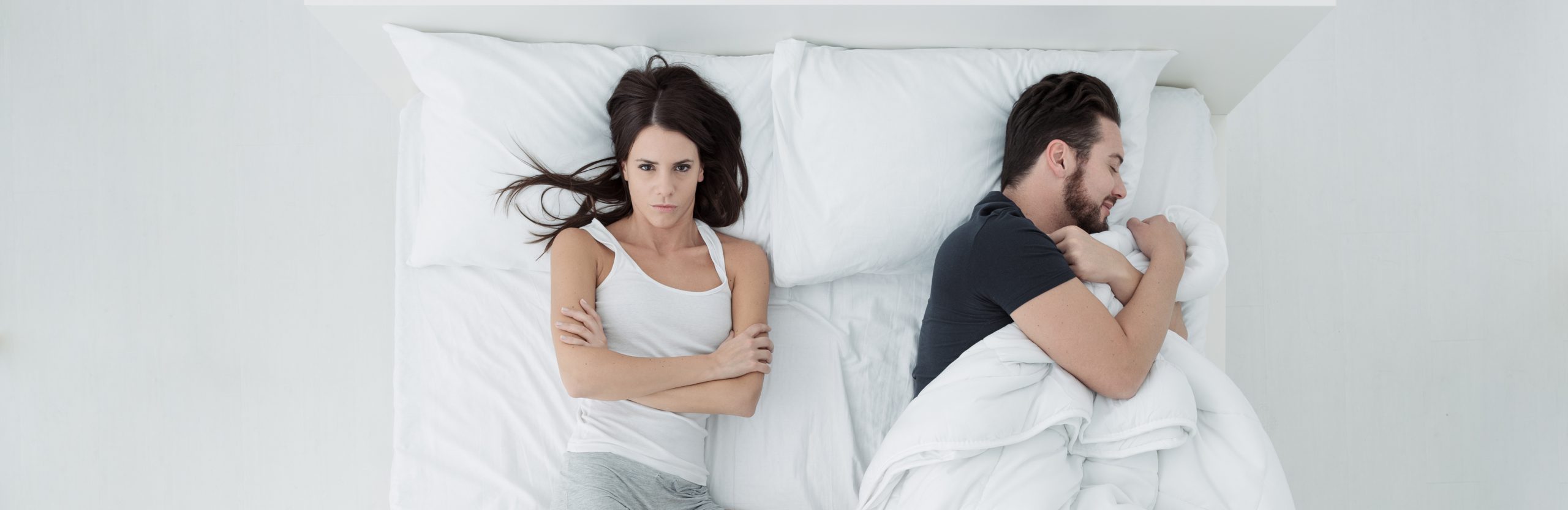 Couple Angry in Bed
