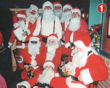 Singing Santas bring joy to needy.